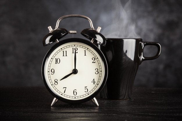 alarm-clock-cup-coffee_62847-155